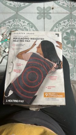 Massaging heating pad