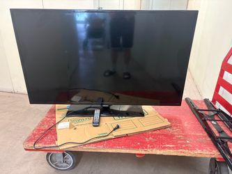Samsung Flat Screen TV with Remote and wallmount( needs screws, etc)