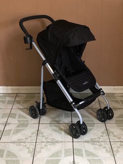 PRACTICALLY NEW EVENFLO REVERSI STROLLER AND BASSINET!!!!