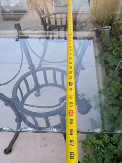 Glass table 66" inches long 42" inches wide