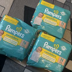 3 brand new pampers for newborn swaddlers 