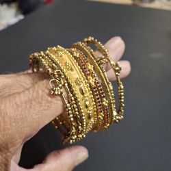 Set Of 8 Goldtone Metal Bangle Bracelets With Beads, Charms & Red Rhinestones For Petite Size Hands 2 1/4" Opening 