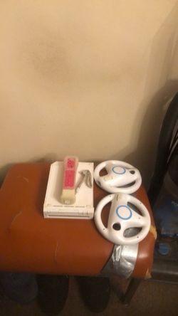Wii work great have cord  and  sensor bar  wheel  controller