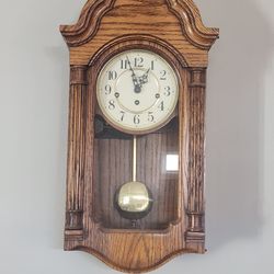 Howard Miller Pendulum Wall Clock - Oak