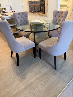 Unique dining table with 4 velvet upholstered chairs