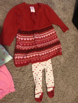 Newborn onesie, 6 mo pineapple and hello Kitty, 9 mo red heart sweater and leggings