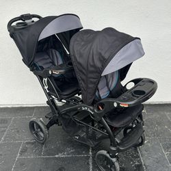 PRACTICALLY NEW BABY TREND SIT AND STAND DOUBLE STROLLER!!