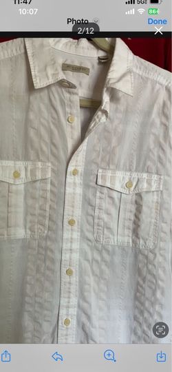 It’s very good shirt for man’s in size Large the color is white made by Burberry