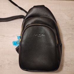 NWT MEDIUM BLACK SLING BAG