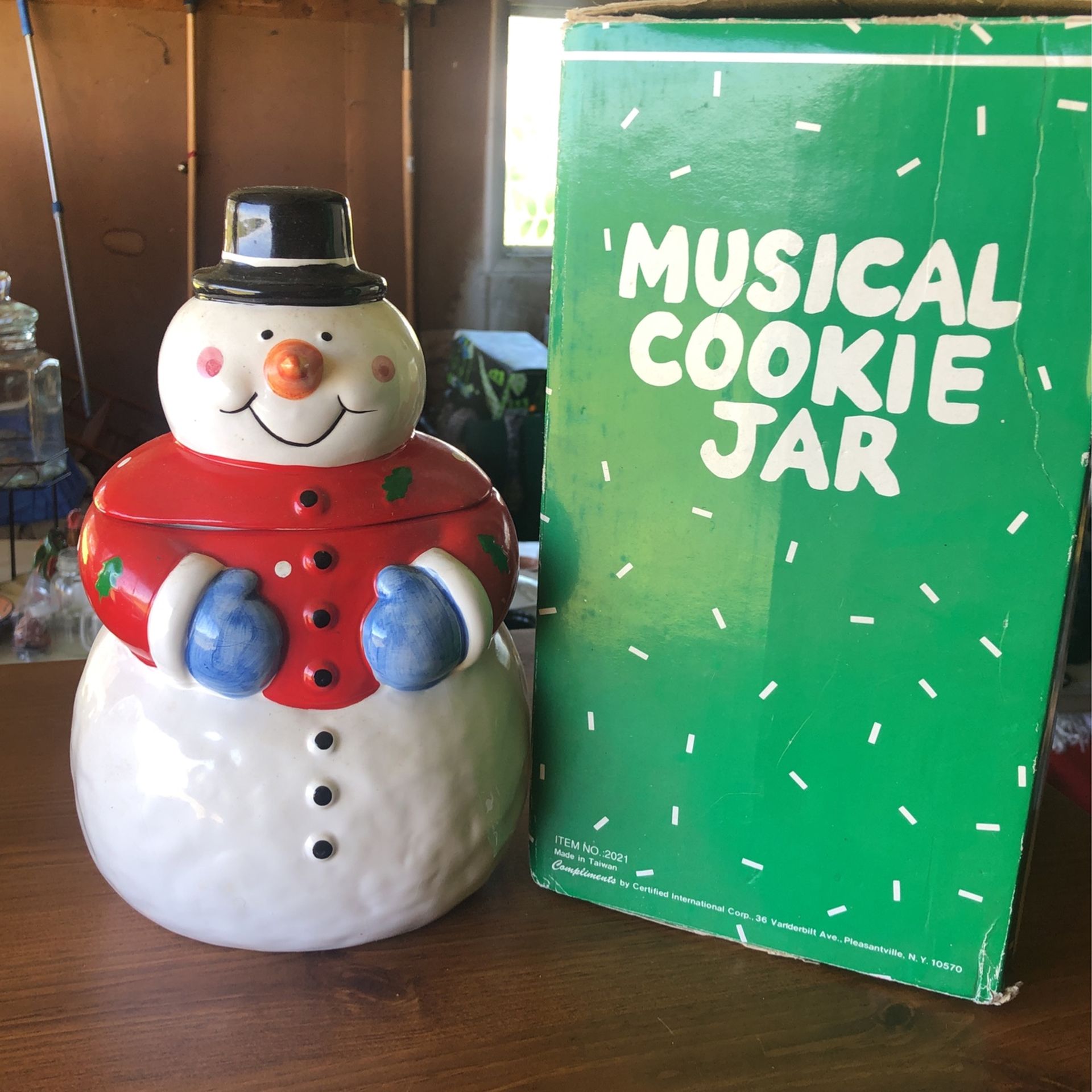 Musical snowman cookie jar