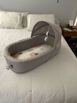 Lulyboo travel bassinet