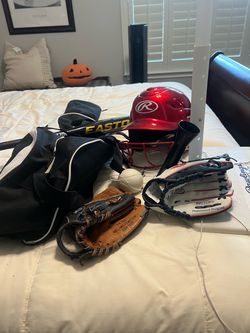 Baseball equipment.. age 7-8 years old
