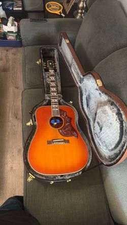 Epiphone inspired by gibson acoustic guitar