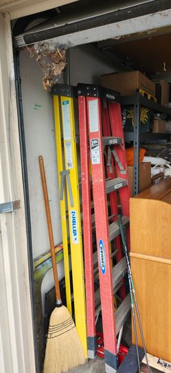 2 ladders wagon white desk with a top piece. Excellent rocking chair. Hey hang exercise bike real nice bar, excellent condition. Roll top