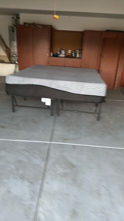 King size platform bed with a memory foam mattress