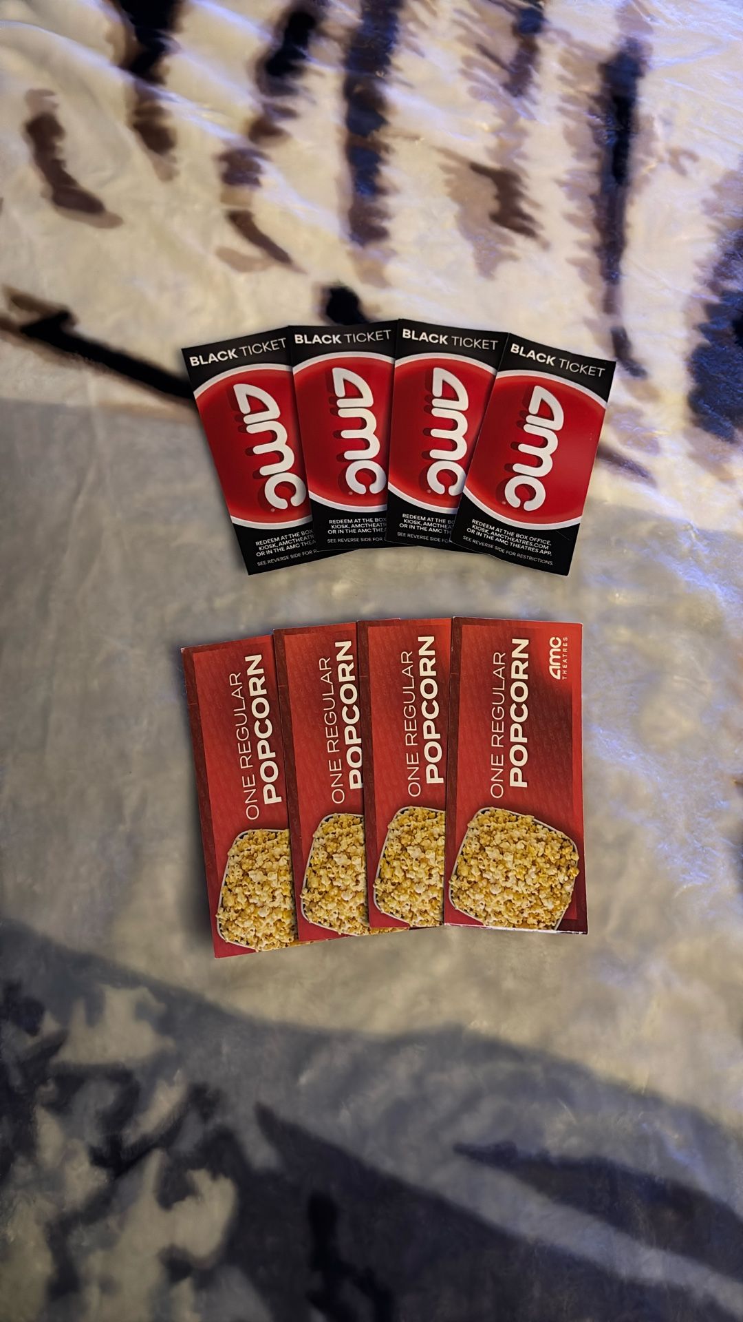 AMC Black Tickets With Popcorn Tickets