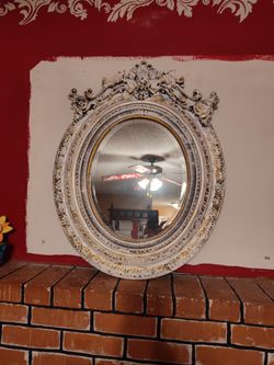 Mirror 27in Wide 33in Tall . Has Angels On The Top$5.