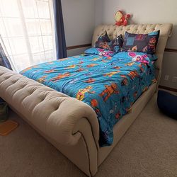 Queen bed tan sleigh tufted style