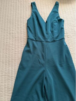 Women teal color jumpsuit size M