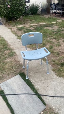 Bathing chair excellent condition silver and light gray color adjustable high