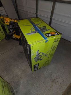 Ryobi table saw with wheel stand.