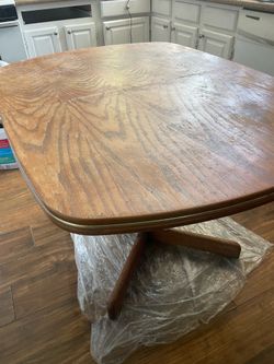 Beautiful wooden   dining table. Size 45 “/ 36 “ 3 feet on the top & 30” H