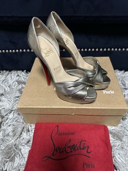 Christian Louboutin size 38 pewter color peep toe platform. Scuffs on shoes as shown
