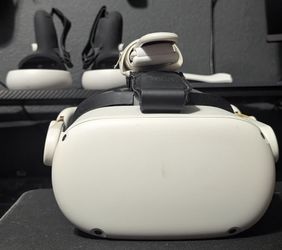 a Meta Quest 2 VR headset equipped with a third-party comfort strap