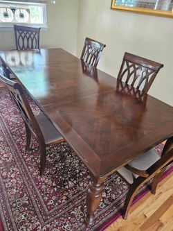 Dark Wood Dining Table with 5 Chairs