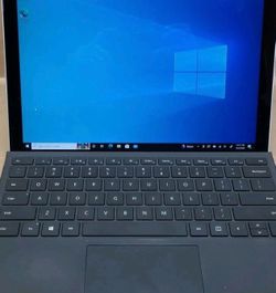 Microsoft surface pro 4 laptop, tablet, computer.