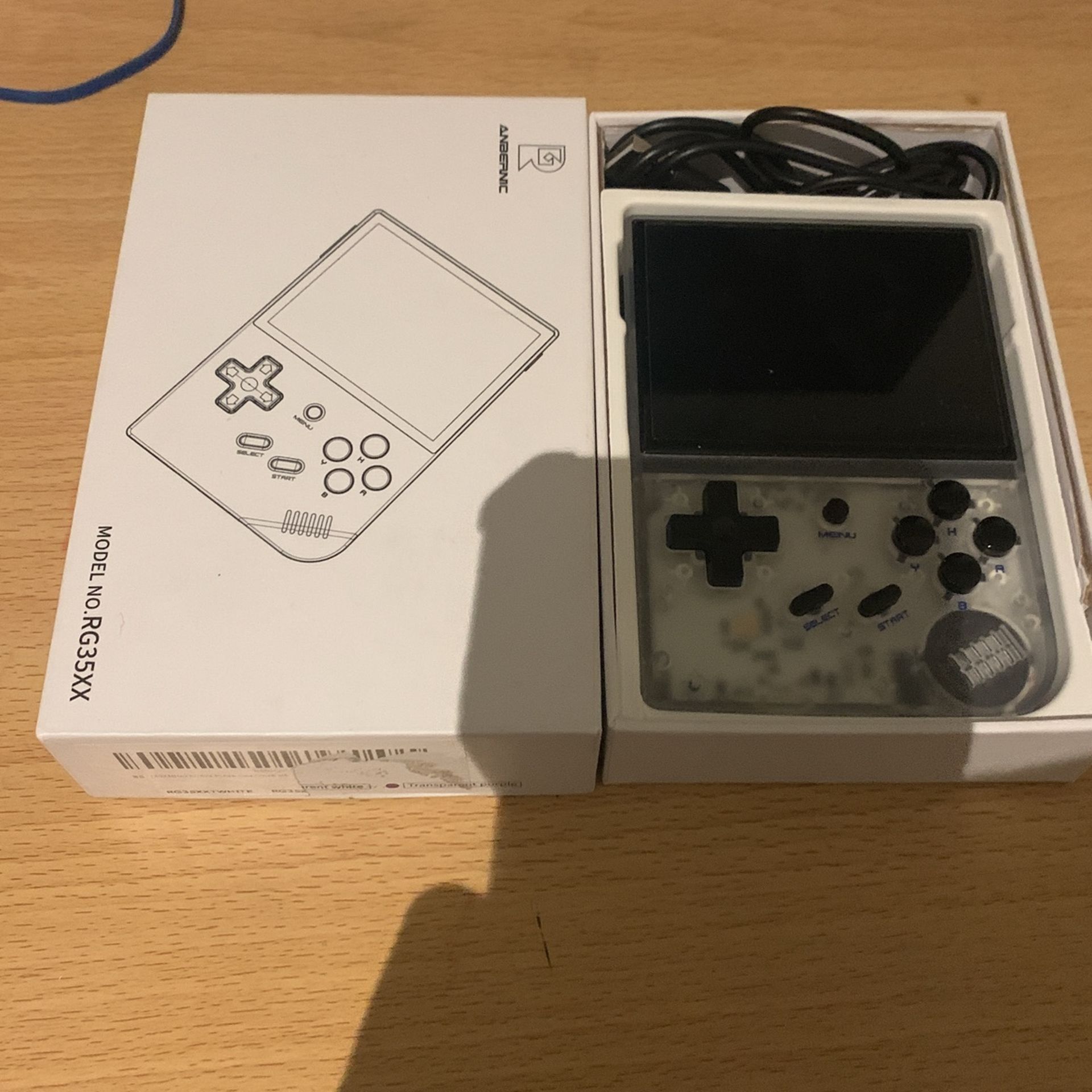 anbernic  (model RG35XX) hardly used it and it is good condition