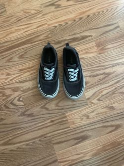 Boys black slip on sneakers