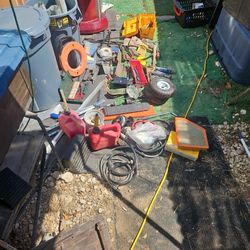 Assortment Of Tools And Various Parts In Tub