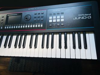 Roland Juno D synth and soft case