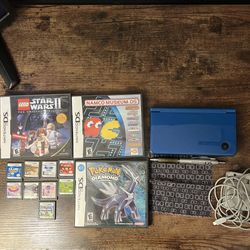 Nintendo DSi XL w/ Games