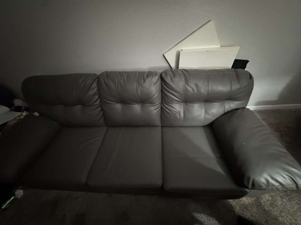 Grey Leather Couch $100/Obo