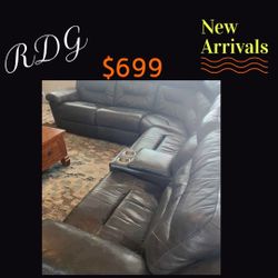 Beautiful, elegant luxury, black, all electric powered sectional sofa with a USB port