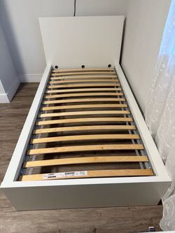IKEA MALM twin bed frame in white.