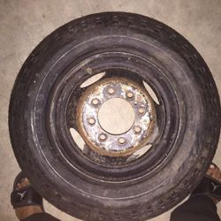 16.5 X 6.00 RIM ON NEW TIRE
