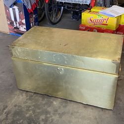 This is a vintage Dresher brass cedar hope chest trunk