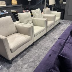 Set of four upholstered armchairs