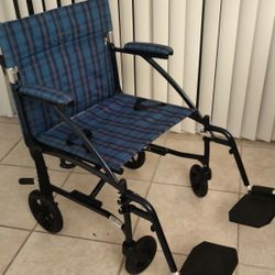 Transport wheelchair. Blue color