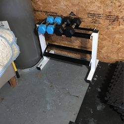 Two sets of dumbbells with dumbbell rack