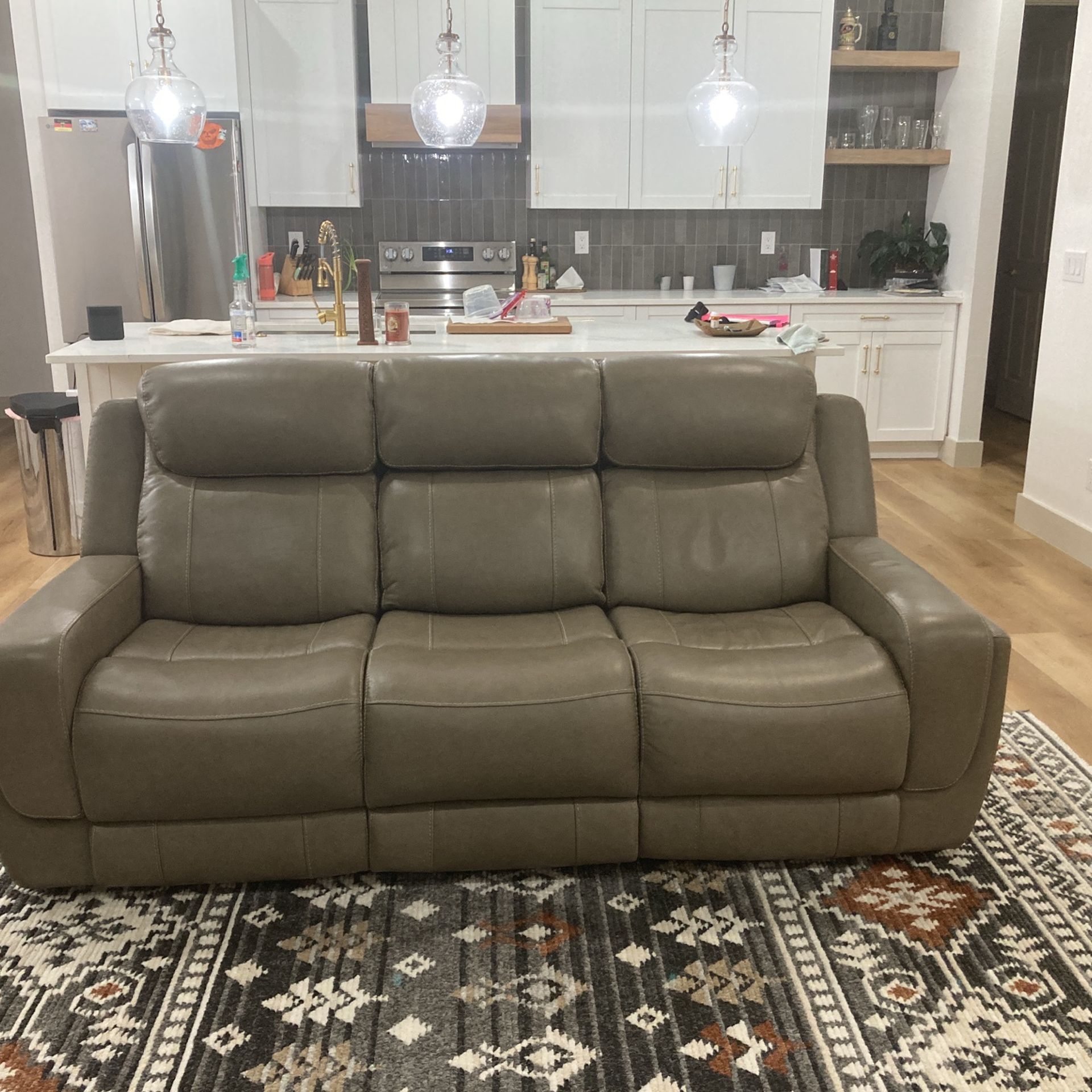 For Sale: Like-New Electric Reclining Brown Leather Couch – One Owner, Smoke-Free Home
