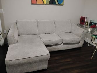 Light gray L shaped sofa