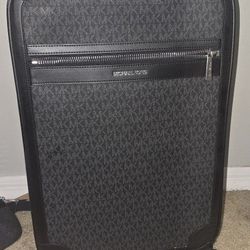 Like New Michael KORS rolling Luggage 