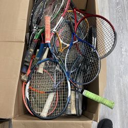 Box Full of Used Tennis Rackets
