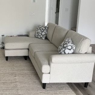 Cream White Emery Chiffon 84” Sectional Sofa with Reversible Chaise by Living Spaces