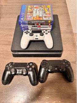 PS4 w/ Games and Controllers