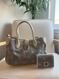Authentic Dooney and Bourke purse and wallet set